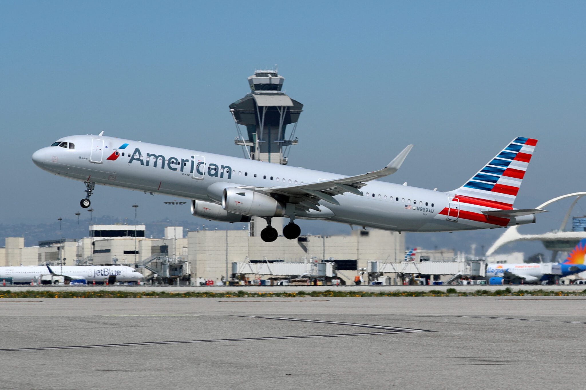 An American Airlines plane taking off from Los Angeles International airport. 